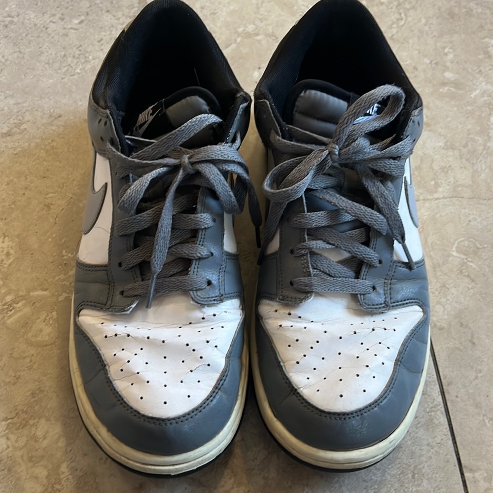 Grey and white Nike size 11 low top sneakers